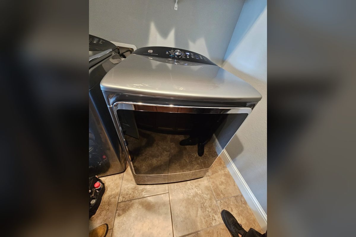 Front-load dryer in a laundry room at a repair call by Washer Repair Anaheim, CA