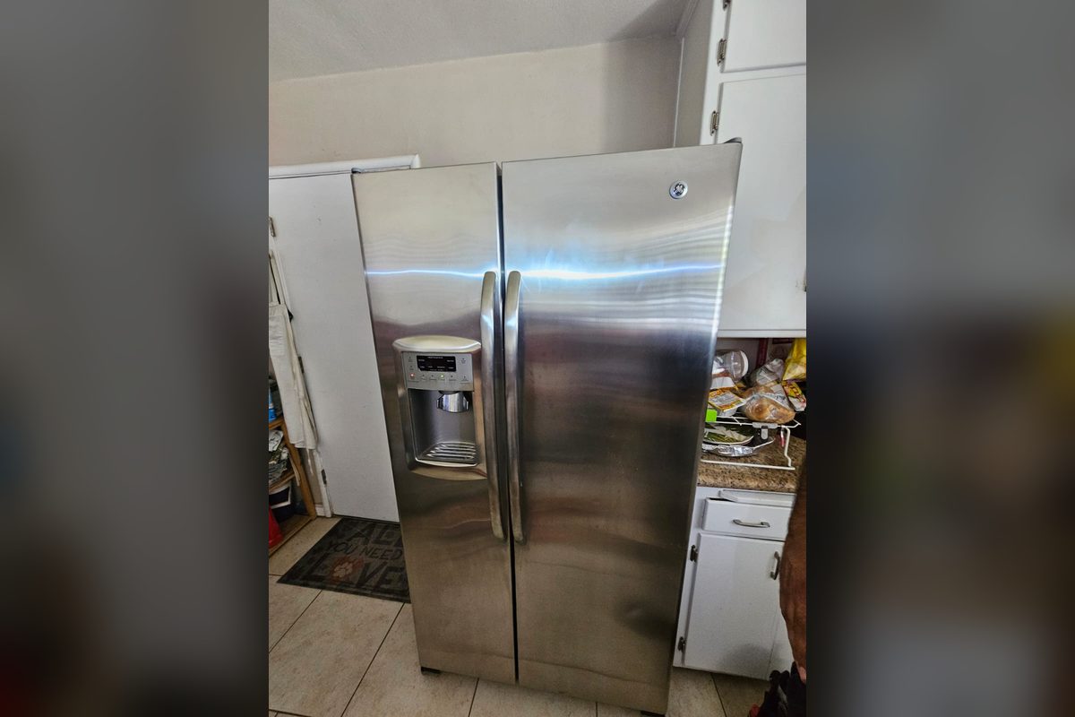GE side-by-side refrigerator and freezer at a repair call by Washer Repair Anaheim, CA