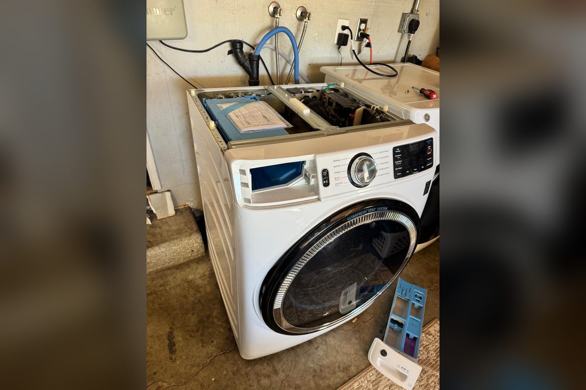 GE front-load washer opened up for repair by Washer Repair Anaheim, CA