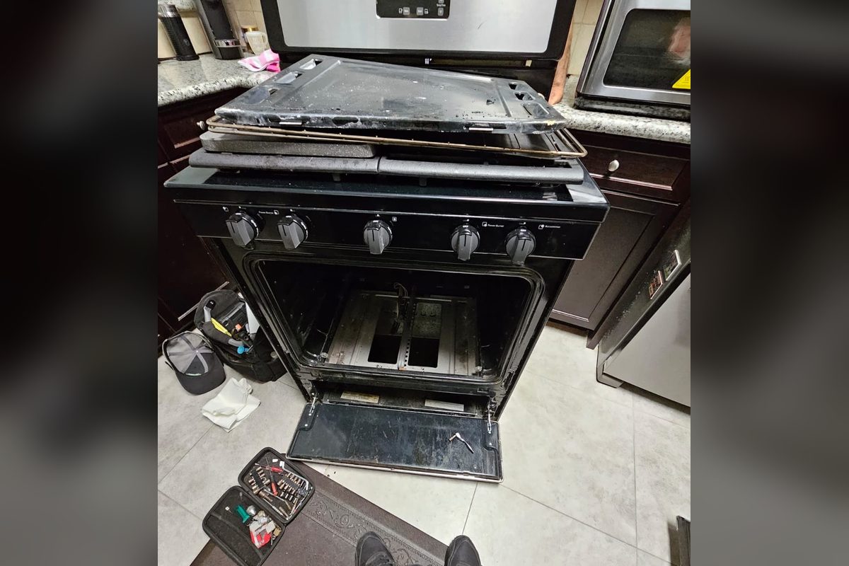 Gas range taken apart during an oven repair by Washer Repair Anaheim, CA